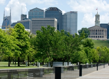 Sidewalk lined with trees