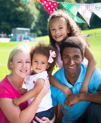 Family_of_four_at_outdoor_festival_no_crop Family_of_four_at_outdoor_festival_no_crop