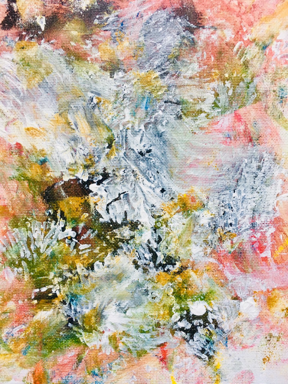 The painting is large bold splotches of color, mostly pinks and whites and greens – it has a feeling of spring flowers. It is just abstract strokes of these colors on a textured canvas