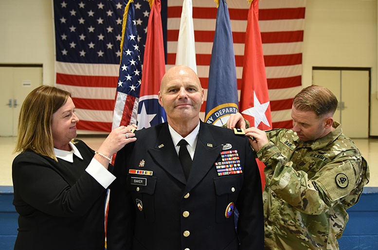 Maj. Gen. Tommy Baker is pinned with his new rank by his wife Camille and his son, 1st Lieut. Cody Baker, during his promotion Ceremony at the Tennessee National Guard headquarters on November 9, 2018. (U.S. Army photograph by Sgt. 1st Class Edgar Castro) Maj. Gen. Tommy Baker is pinned with his new rank by his wife Camille and his son