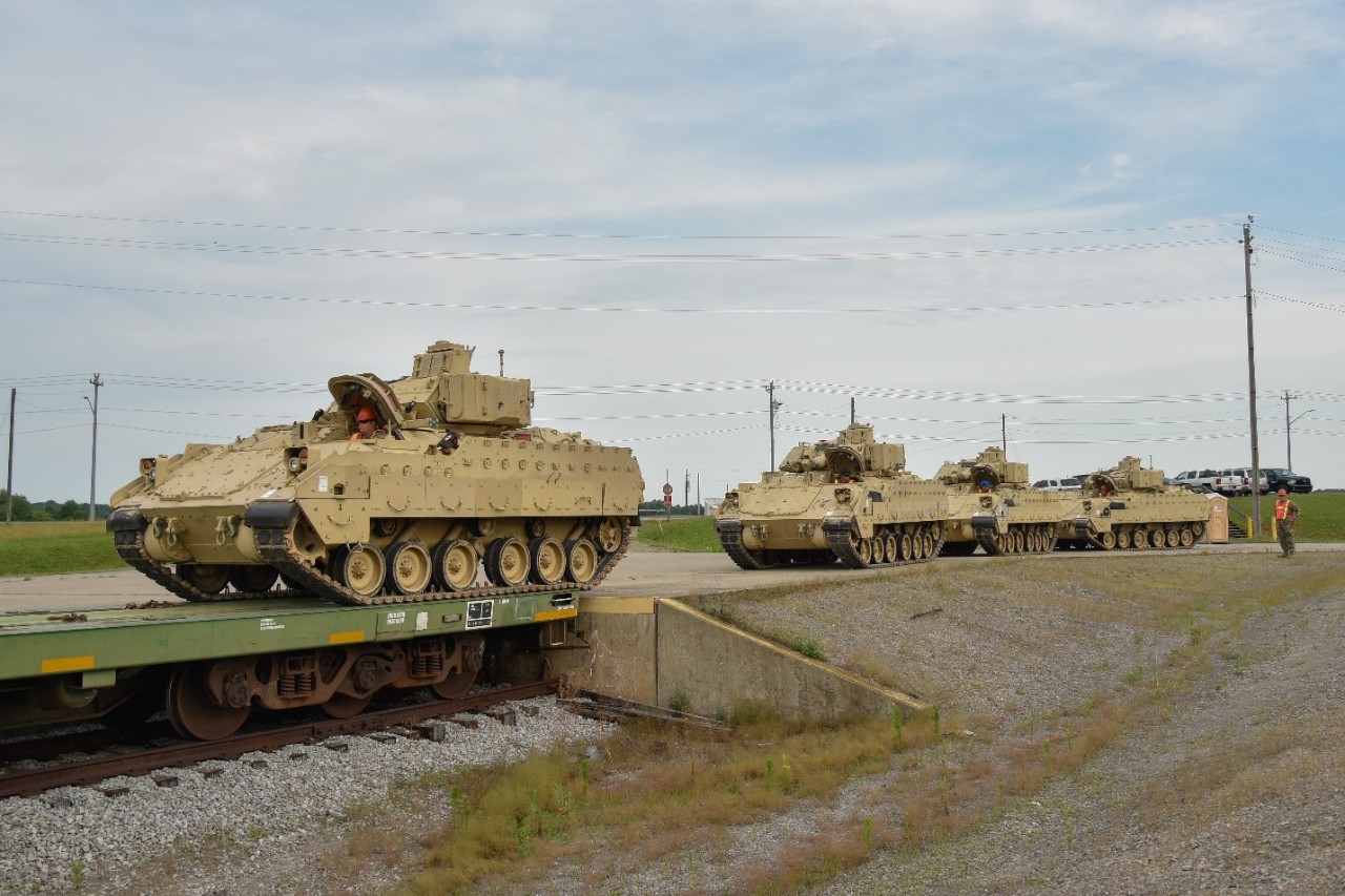 Soldiers from the 278th Armored Cavalry Regiment load Bradley Fighting Vehicles onto trains, June 21, at Fort Campbell. Approximately 1,000 vehicles, tanks and pieces of equipment are being loaded onto trains in preparation for XCTC, a three-week training exercise that will be taking place in Fort Hood over the summer. (Photo by Sgt. 1st Class Timothy Cordeiro) Soldiers from the 278th Armored Cavalry Regiment load Bradley Fighting Vehicles onto trains, June 21, at Fort Campbell. Approximately 1,000 vehicles, tanks and pieces of equipment are being loaded onto trains in preparation for XCTC, a three-week training exercise that will be taking place in Fort Hood over the summer. (Photo by Sgt. 1st Class Timothy Cordeiro)