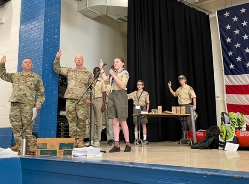 Tennessee National Guard’s Col. Jimmy Reed and Sgt. 1st Class Ken Weichert helped lead the Scout Oath during the opening ceremony of the Merit Badge University held in Nashville on April 30. (Photo by: Capt. Kealy Moriarty) Tennessee National Guard’s Col. Jimmy Reed and Sgt. 1st Class Ken Weichert helped lead the Scout Oath during the opening ceremony of the Merit Badge University held in Nashville on April 30. (Photo by: Capt. Kealy Moriarty)