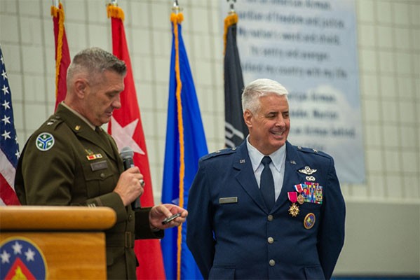 Maj. Gen. Jeff Holmes, Tennessee’s Adjutant General, presents Brig. Gen. Thomas Cauthen with an award during Cauthen’s retirement ceremony held at McGhee Tyson Air National Guard Base in Knoxville, Aug. 6. Cauthen retired from the Tennessee Air National Guard with 38 years of service to the state of Tennessee. (Air National Guard photo by Staff Sgt. Melissa Dearstone.) Maj. Gen. Jeff Holmes, Tennessee’s Adjutant General, presents Brig. Gen. Thomas Cauthen with an award during Cauthen’s retirement ceremony held at McGhee Tyson Air National Guard Base in Knoxville, Aug. 6. Cauthen retired from the Tennessee Air National Guard with 38 years of service to the state of Tennessee. (Air National Guard photo by Staff Sgt. Melissa Dearstone.)