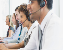 Picture of staff taking consumer calls. Picture of staff taking consumer calls.