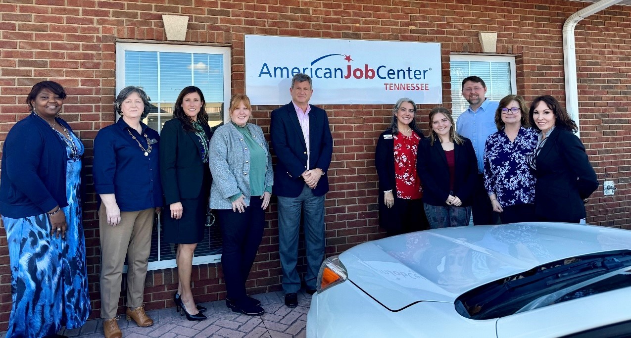 Individuals standing outside the Cookeville American Job Center at grand opening