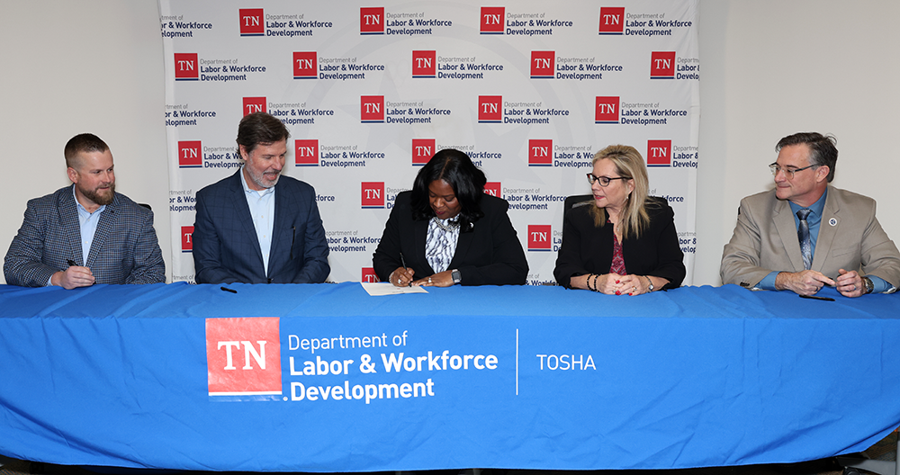 TDLWD Commissioner Deniece Thomas, other TDLWD officials and TBA officials